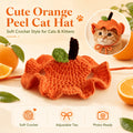 Cat wearing orange peel crochet hat